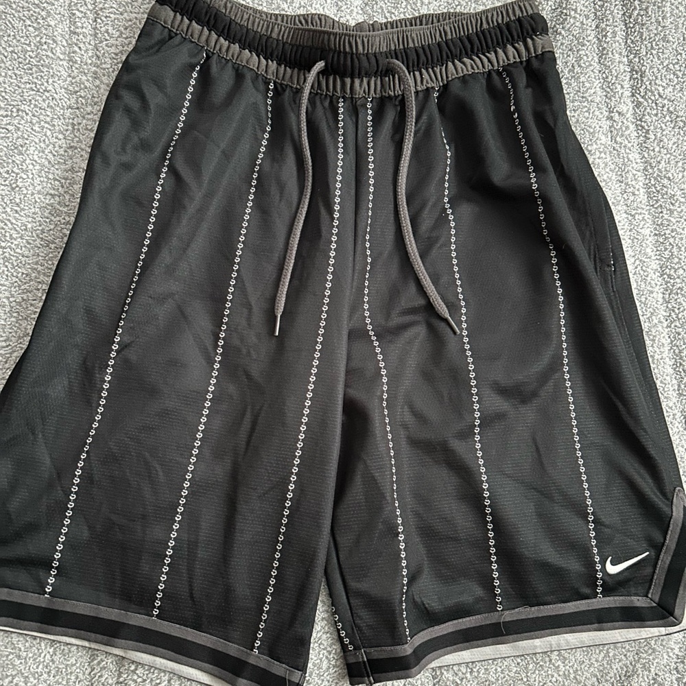 Nike men’s basketball shorts, size SMALL